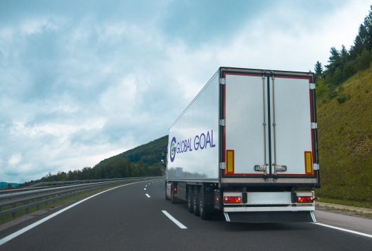 Semi truck with trailer on highway road